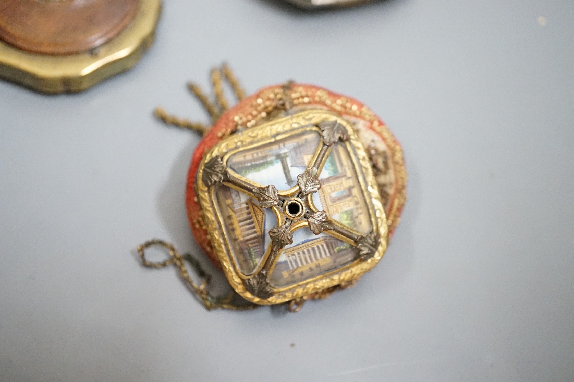 A 19th century Continental Royal commemorative purse and four Grand Tour souvenir purses